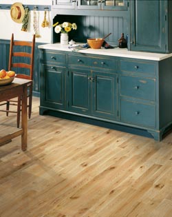 teal cabinets and hardwood kitchen flooring in enid